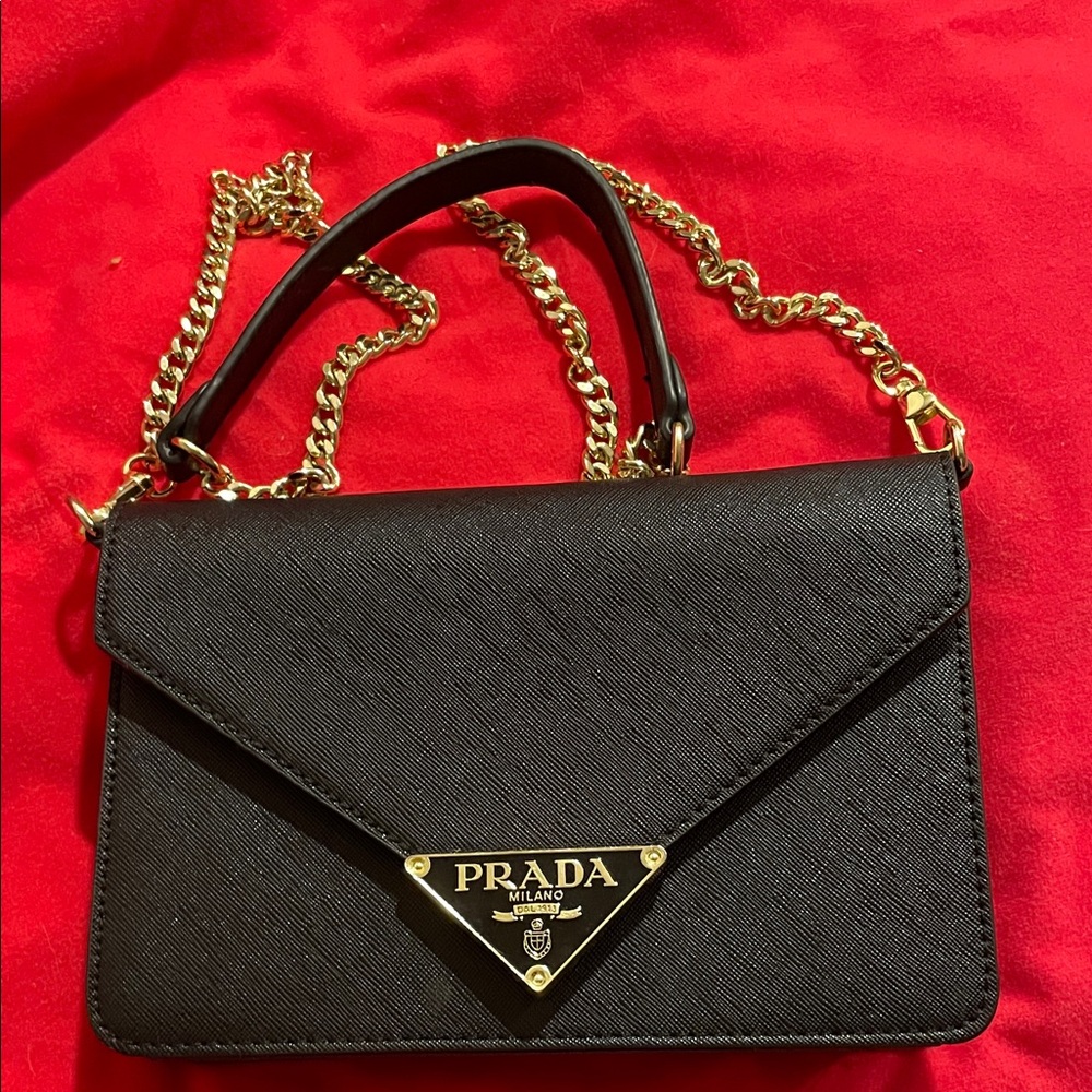 Prada Elegant Black Crossbody with Gold Accents